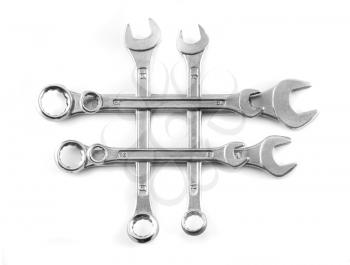 Group of different chrome wrenches isolated over white