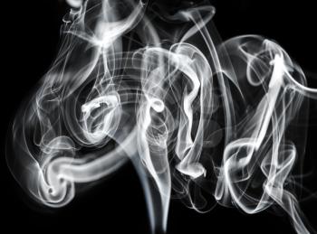 Mysterious: white smoke abstraction over black backgroun d