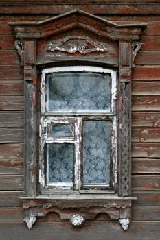 window of very old wooden russian house
