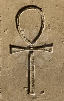 Ancient egypt symbol Ankh (Key of Life, Eternal Life, Egyptian Cross) carved on the stone in the Karnak Temple, Luxor