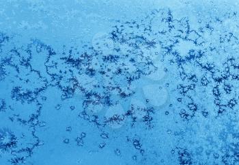Beautiful ice pattern on winter glass