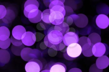 Blurred lilac lights holiday background