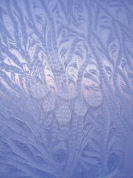 Frosty natural pattern on winter window glass