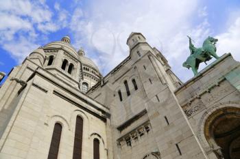 Angle view of Basilica Sacre Coeur, Roman Catholic Church and minor basilica, dedicated to Sacred Heart of Jesus, Paris, France