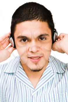 Royalty Free Photo of a Man Listening to Headphones