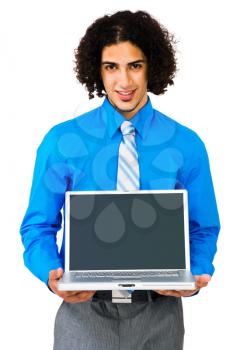Royalty Free Photo of a Young Man Presenting a Laptop