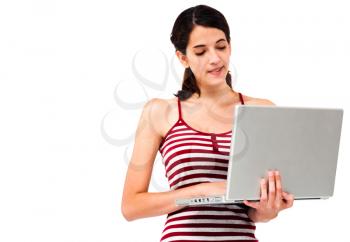 Royalty Free Photo of a Young Woman Using a Laptop