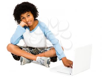 Portrait of a boy surfing the net isolated over white