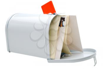 Close-up of envelopes in a mailbox isolated over white
