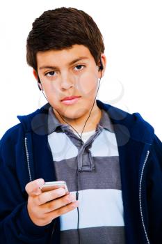 Caucasian boy listening to music isolated over white