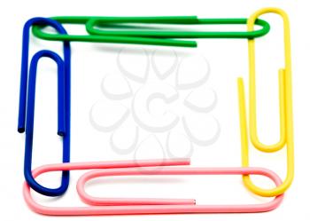 Four paper clips isolated over white