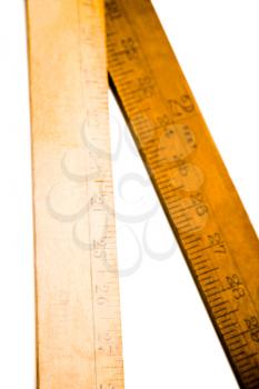 Wooden rulers isolated over white