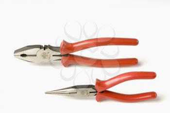 Close-up of two pliers