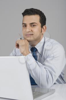Businessman in front of a laptop