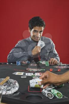 Portrait of a man gambling in a casino