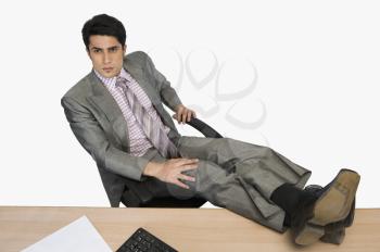 Businessman relaxing in an office