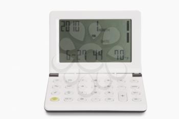 Close-up of a calculator cum alarm clock