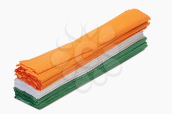 High angle view of a stack of colorful papers representing Indian flag