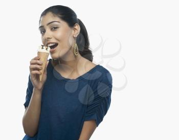 Portrait of a woman eating ice cream