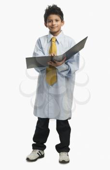 Boy dressed as a businessman