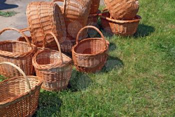 brown baskets on green herb