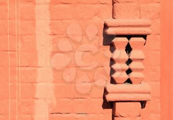 decorative element on brick wall