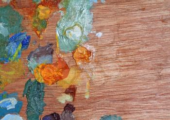 wooden palette with oil paint