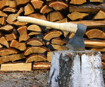 Tools axe and birch log on background firewood