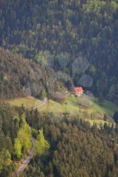 Picturesque landscape of a European secluded country house in a forest of Schwarzwald