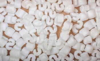 Polystyrene beads for insulation useful as a background
