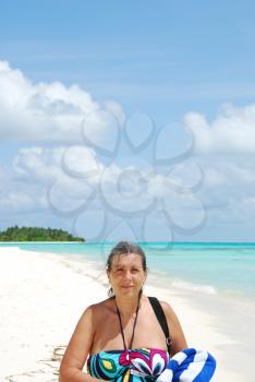 Royalty Free Photo of a Woman on a Beach in the Maldives