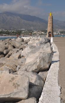 Royalty Free Photo of a Famous Lighthouse in Puerto Banus Marbella, Spain