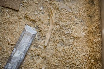 A chisel in the sand