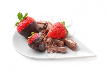 Delicious strawberries with chocolate on white background�