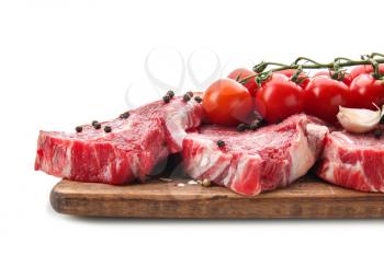 Fresh raw meat with spices and vegetables on white background�