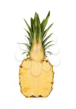 Half of ripe pineapple on white background�