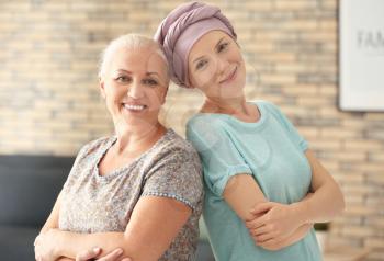 Mother with her daughter after chemotherapy at home�