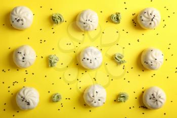 Composition with tasty Chinese dumplings on color background�