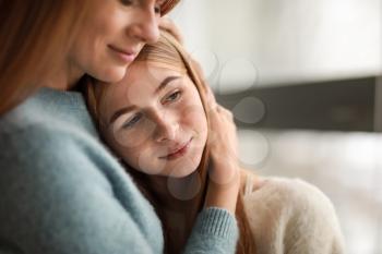 Portrait of happy mother with daughter�
