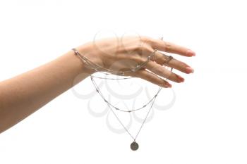 Female hand with stylish necklace on white background�