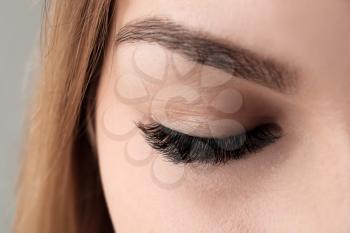 Young woman with beautiful eyelashes, closeup�