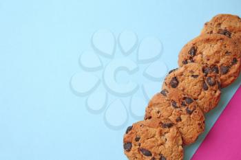Tasty cookies on color background�