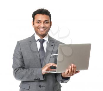 Portrait of handsome businessman with laptop on white background�