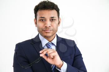 Handsome businessman on white background�