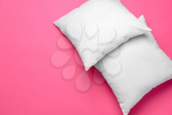 Soft pillows on color background�