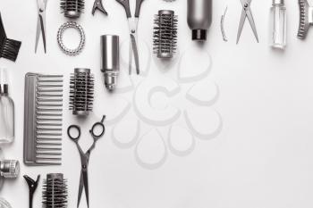 Set of hairdresser tools and accessories on white background�