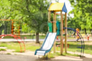 Blurred view of playground in park�