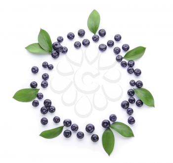 Frame made of fresh acai berries on white background�