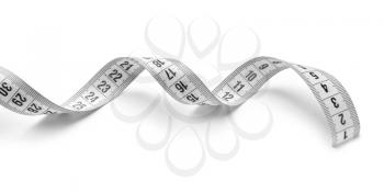 Measuring tape on white background�