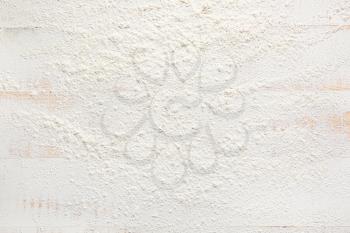 Scattered flour on white background�